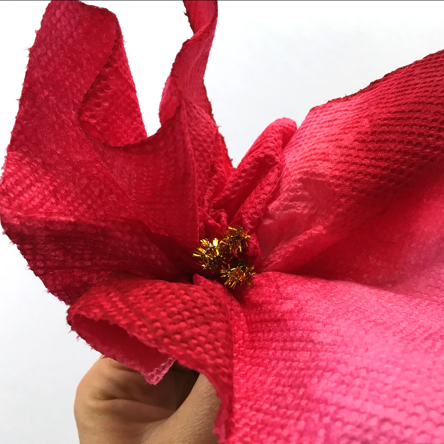 Poinsettia craft for kids gold center close up